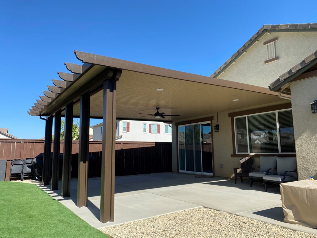 Modern DuraCool aluminum patio cover providing shade and comfort in an Orange County backyard