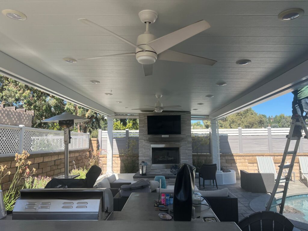 Alumawood solid patio cover providing full shade in a modern Orange County backyard
