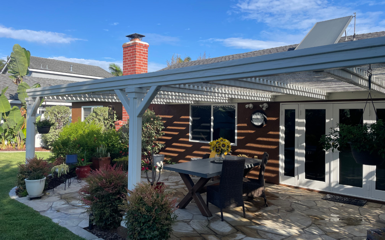 Modern patio cover installation in Orange County during fall — showing why it’s the best time to install patio cover Orange County homeowners love