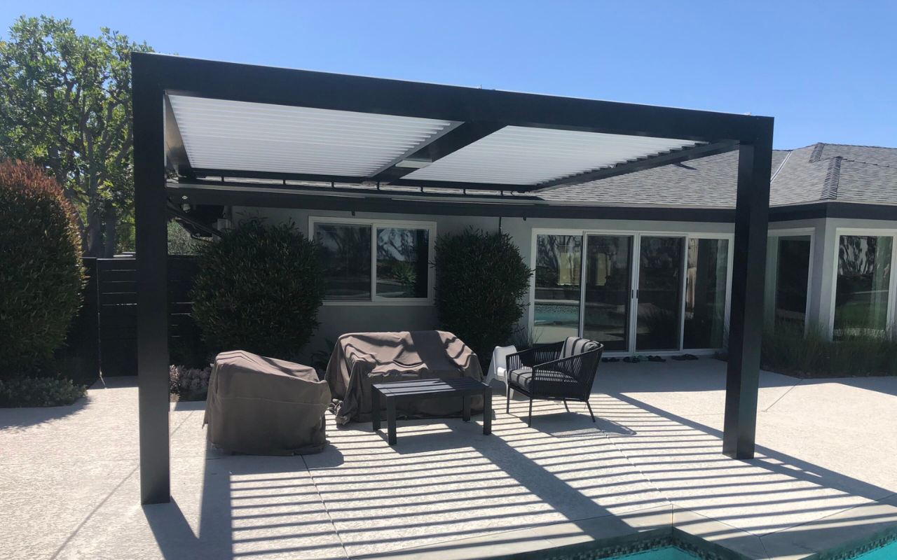 Equinox louvered patio cover in Orange County home providing adjustable shade and smart home control