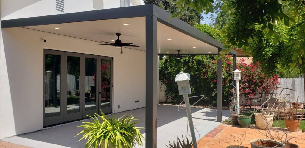 Alumawood solid patio cover enhancing an outdoor backyard space with shade and style