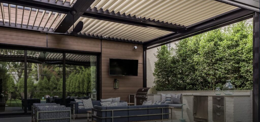 Sleek Equinox Louvered Patio Cover with motorized adjustable louvers, providing sun, shade, and ventilation for Orange County homes